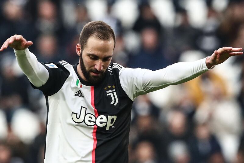 Juventus forward Gonzalo Higuain reacts after missing a goal opportunity. AFP