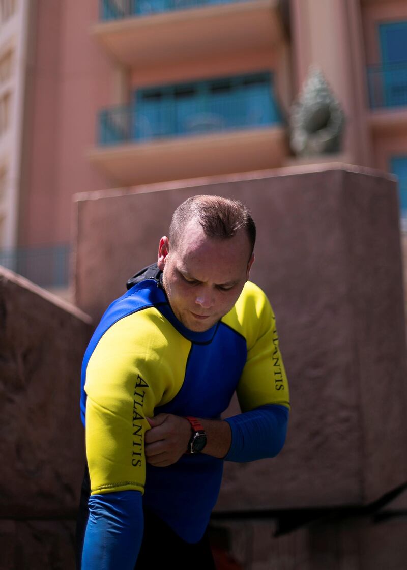 DUBAI, UNITED ARAB EMIRATES - JULY 16 2019.

Abdulla Yaulin, Uzbek diver at Atlantis who proposes to dozens of women from underwater at Ossiano every year.

(Photo by Reem Mohammed/The National)

Reporter: 
Section: AC