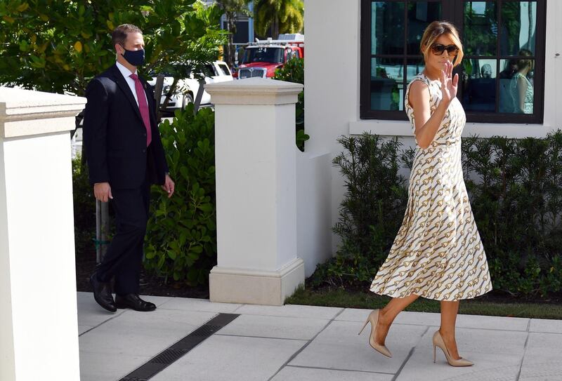 First lady Melania Trump arrives to vote at the Morton and Barbara Mandel Recreation Center, Tuesday, Nov. 3, 2020, in Palm Beach, Fla. (AP Photo/Jim Rassol)