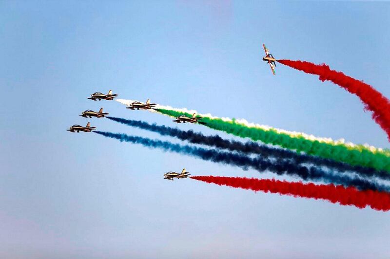 The Emirates Knights team decorates the Yas Marina Circuit before the Formula One race begins. Jorge Ferrari / Wam