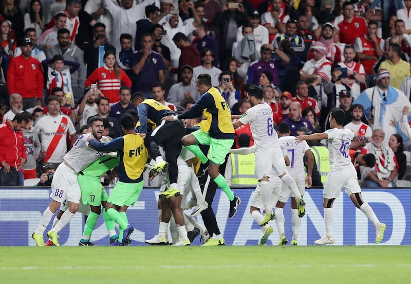 Al Ain, United Arab Emirates - December 18, 2018: Al Ain celebrate winning the game after the match between River Plate and Al Ain in the Fifa Club World Cup. Tuesday the 18th of December 2018 at the Hazza Bin Zayed Stadium, Al Ain. Chris Whiteoak / The National
