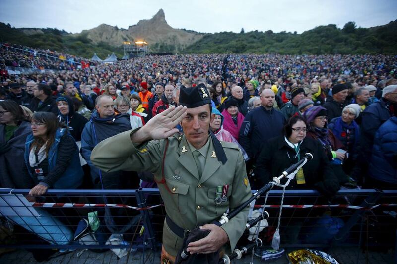A bagpiper from the Australian army salutes during a dawn ceremony marking the 100th anniversary of the Battle of Gallipoli, at Anzac Cove in Gallipoli on April 25. Reuters