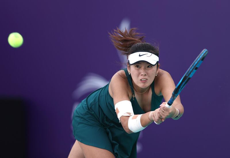 Zhaoxuan Yang of China plays a backhand against Sofia Kenin of USA during their Women's Singles match on Day Two of the Abu Dhabi WTA Women's Tennis Open. Getty Images