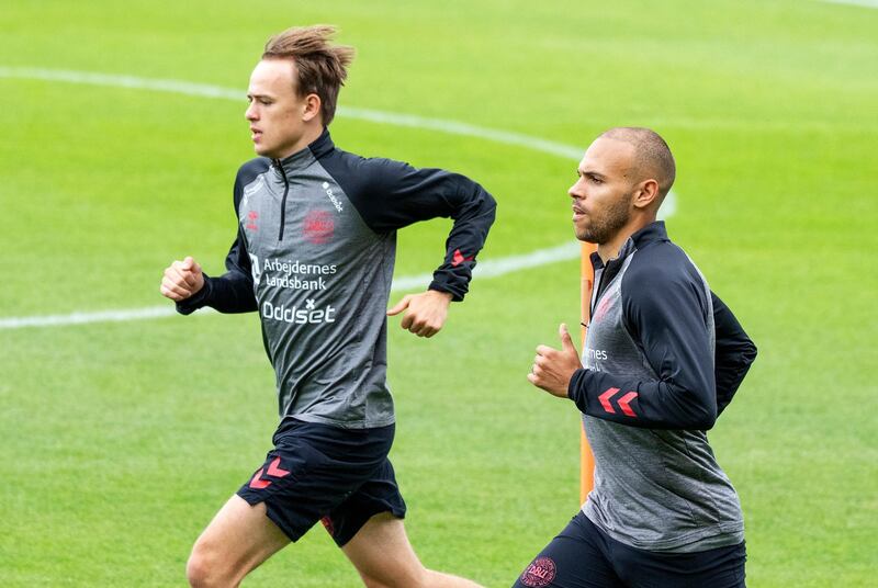 Denmark's Mikkel Damsgaard, left, and Martin Braithwaite during a training session in Elsinore, Denmark ahead of their Euro 2020 match against Wales on Saturday. AP