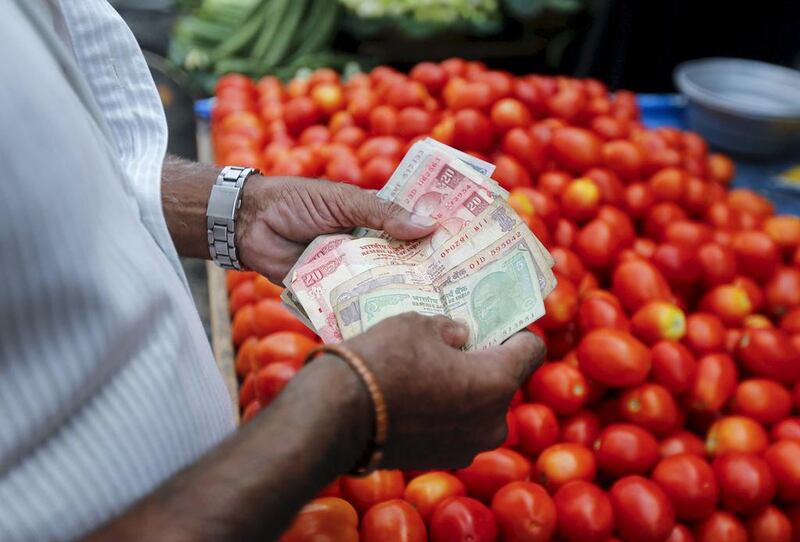 A vegetable trader in Mumbai. Many Muslims in India reluctantly use the conventional banking system and others avoid using banks altogether. Shailesh Andrade / Reuters