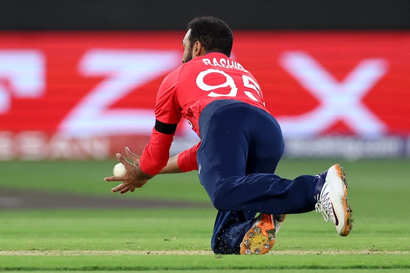 Adil Rashid of England takes a catch off his own bowling to dismiss Babar Azam of Pakistan. Getty