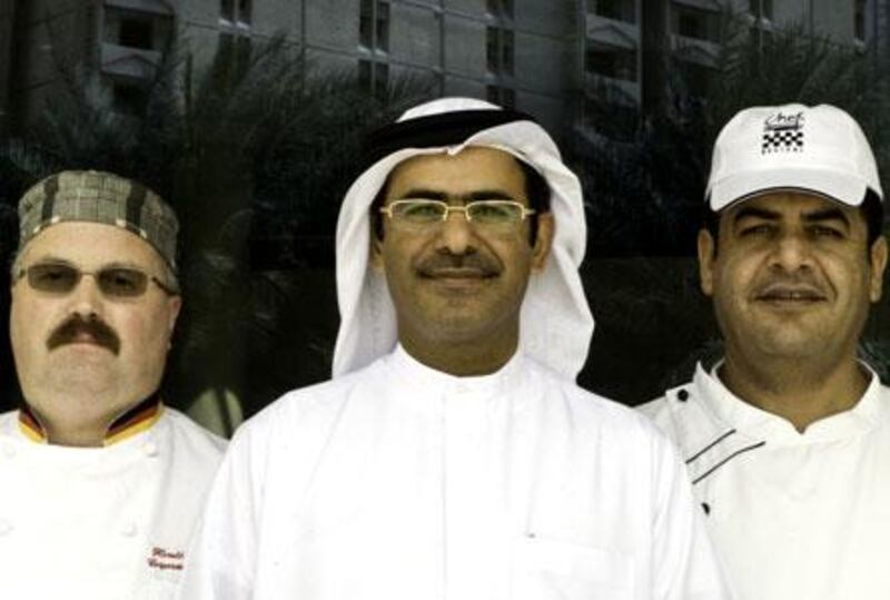 The corporate executive chef Harald Oberender, the director of hospitality Mohammed Ali Matar al ­Jumairi and the executive banqueting chef Khalel Mustafa ­Oqdeh from the Dubai World Trade Centre.