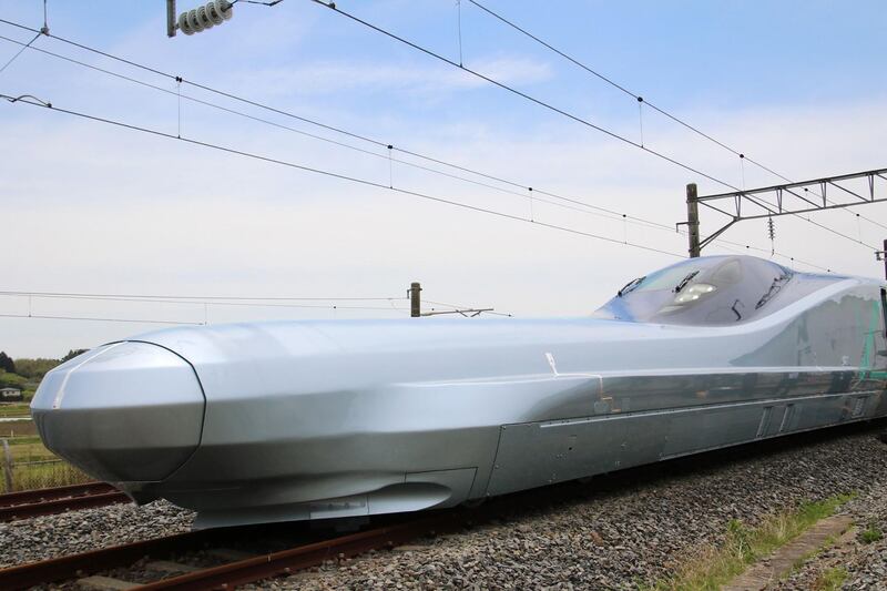 (FILES) In this file photo taken on May 9, 2019, JR East's new test bullet train "ALFA-X" is seen in Rifu, Miyagi prefecture. A prototype of Japan's next-generation Shinkansen bullet train, set to be the fastest train on wheels when it enters service, reached speeds of 320 kilometres (198 miles) per hour on a test run on May 16. The train, code-named ALFA-X, will eventually hit 360 kilometres per hour when it begins to take passengers in about a decade, according to East Japan Railway. - Japan OUT
 / AFP / JIJI PRESS / JIJI PRESS
