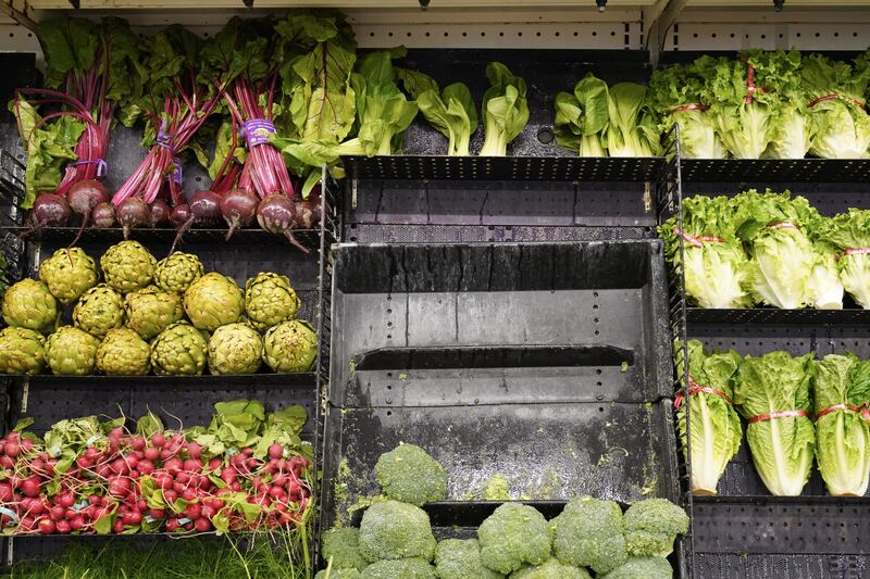 An empty vegetable shelf at Karns Foods in York County, Pennsylvania. Supermarkets across the US have struggled to keep their shelves stocked because of supply chain issues.