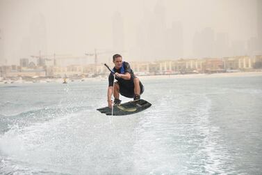 Dubai resident Francois de Klerk, 38, who bought a boat in 2011 to go wakeboarding every weekend, now saves 40 per cent of his monthly income - with a third of that money invested with robo-advisory Sarwa.  Photo credit: Francois de Klerk 