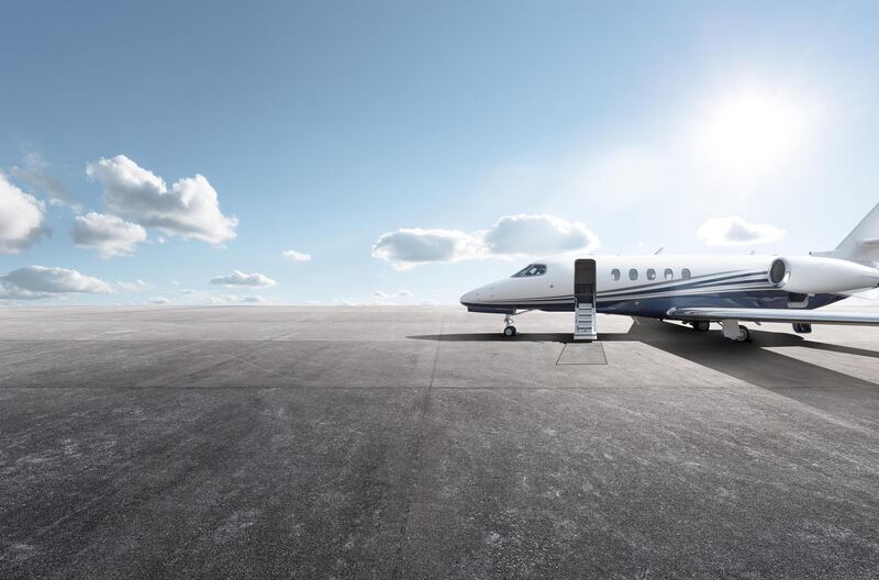 Private aircraft parked on the tarmac. Getty Images