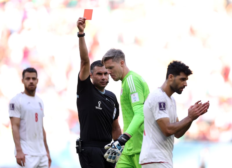 Wayne Hennessey of Wales is shown a red card by referee Mario Alberto Escobar Toca. Getty
