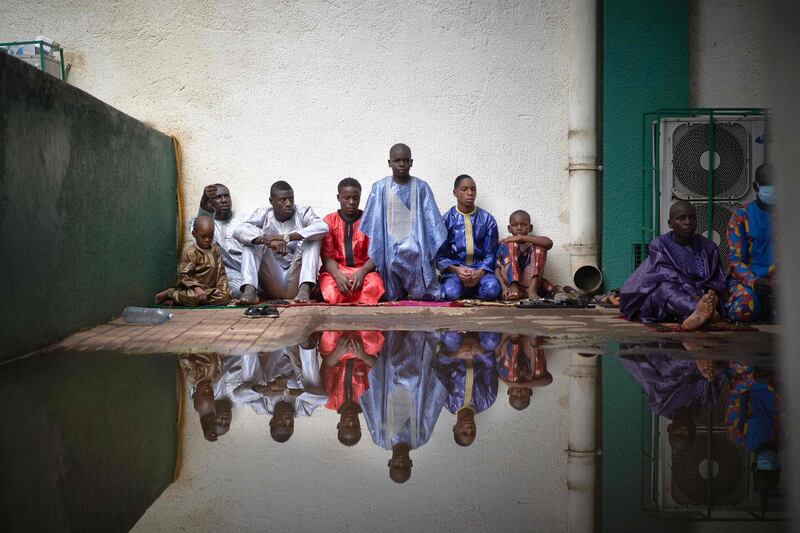 Faithfuls are seen at the prayer for Eid al-Fitr, the holiday that marks the end of the Holy Month of Ramadan, in the central Mosque of Bamako. AFP