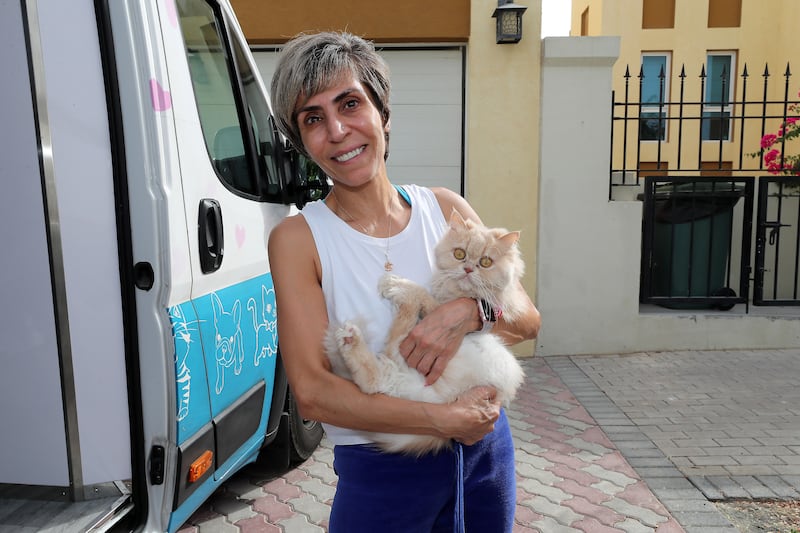 Majeda with her cat Luna before the grooming session. All photos: Pawan Singh / The National