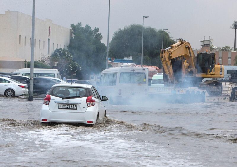 Dubai, United Arab Emirates - Flooded street due to rain today in Al Quoz Industrial area.  Leslie Pableo for The National 