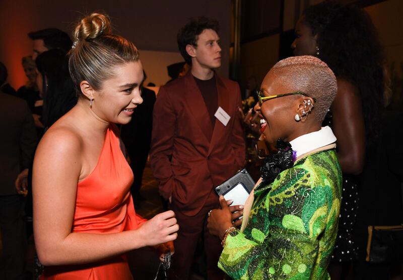 Florence Pugh talks with Cynthia Erivo. AFP