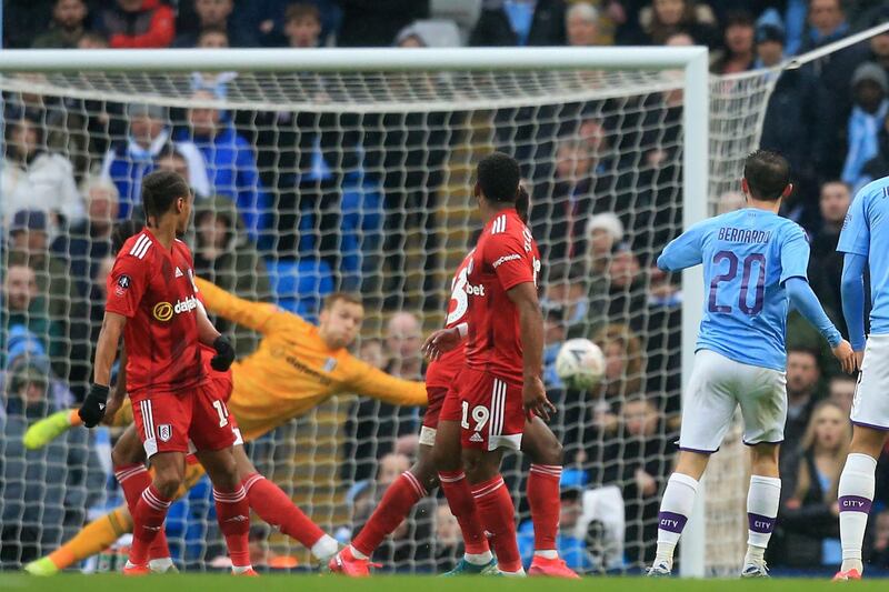 Manchester City's Bernardo Silva scores their second goal. AFP