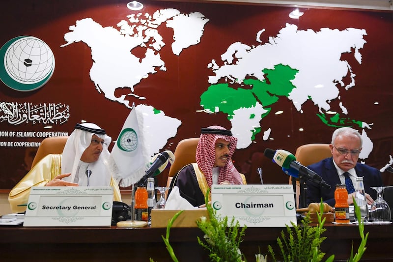 Palestinian Foreign Minster Riyad Al Maliki (right) delivers a speech during an emergency ministerial meeting of the Organisation of Islamic Cooperation (OIC) in Jeddah. AFP