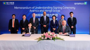 Janet Kong, chief executive of Hengli Petrochemical International, and Saleh Al Zaid, acting president for Aramco Asia, signed the deal on Monday. Photo: Aramco