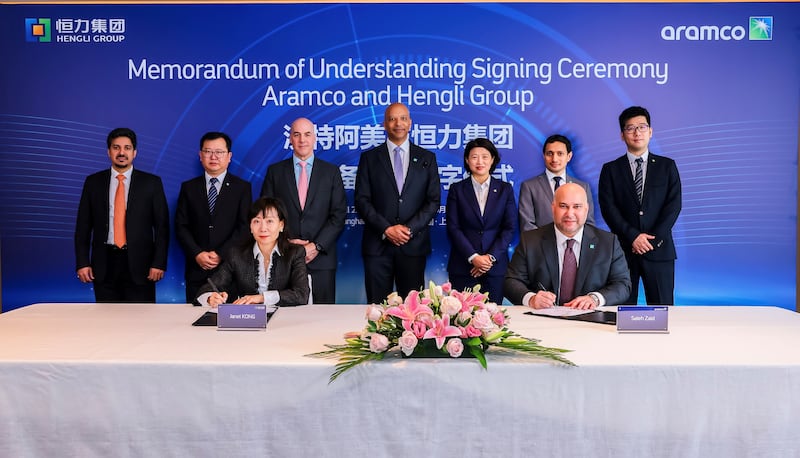 Janet Kong, chief executive of Hengli Petrochemical International, and Saleh Al Zaid, acting president for Aramco Asia, signed the deal on Monday. Photo: Aramco