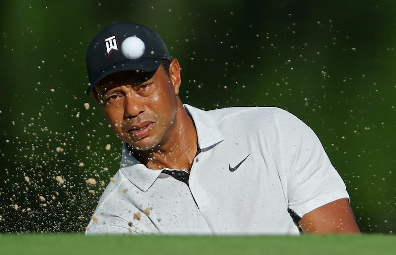 Tiger Woods plays a shot from a bunker during a practice round prior to the start of the 2022 PGA Championship at Southern Hills Country Club on May 16, 2022 in Tulsa, Oklahoma. Getty
