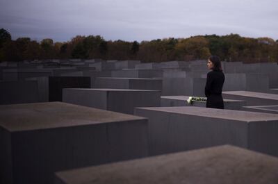 German Foreign Minister Annalena Baerbock laid flowers at the Holocaust memorial in Berlin on Thursday. AP 