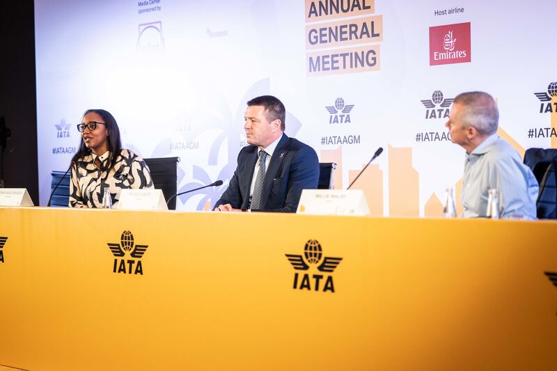 Iata director general Willie Walsh, right, with outgoing board of governors chair Yvonne Makolo, left, and her successor Pieter Elbers, centre, at the end of the association's annual meeting in Dubai. Photo: Iata