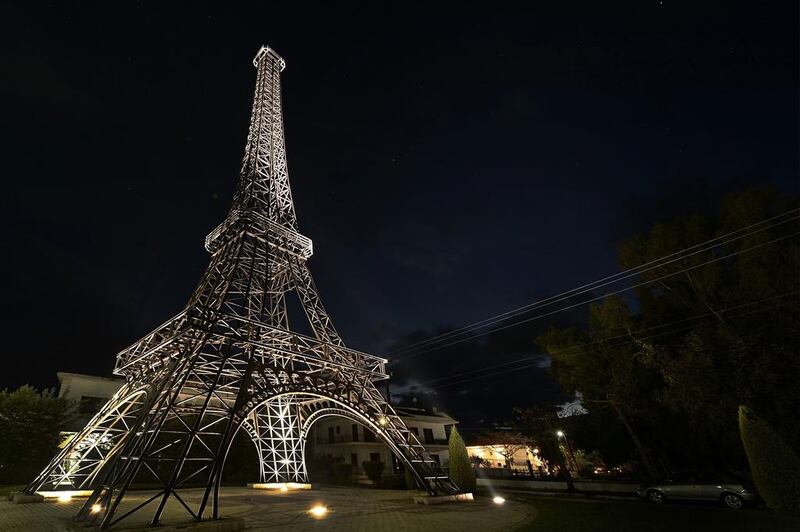 A 26-metre high replica of the Eiffel tower made by Greek doctor and sculptor Harris Fournarakis at Filiatra village, 280 kilometres south west of of Athens. Aris Messinis / AFP Photo