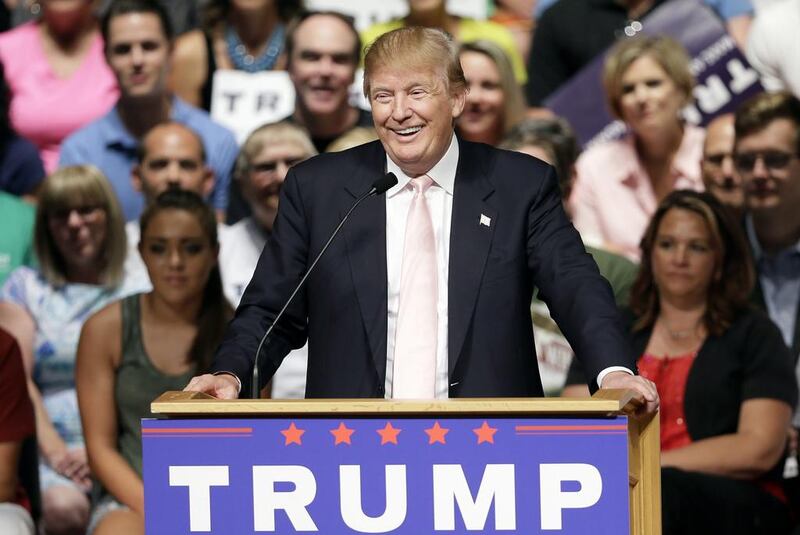 Republican presidential candidate Donald Trump speaks at a rally and picnic in Oskaloosa, Iowa. Charlie Neibergall / AP Photo