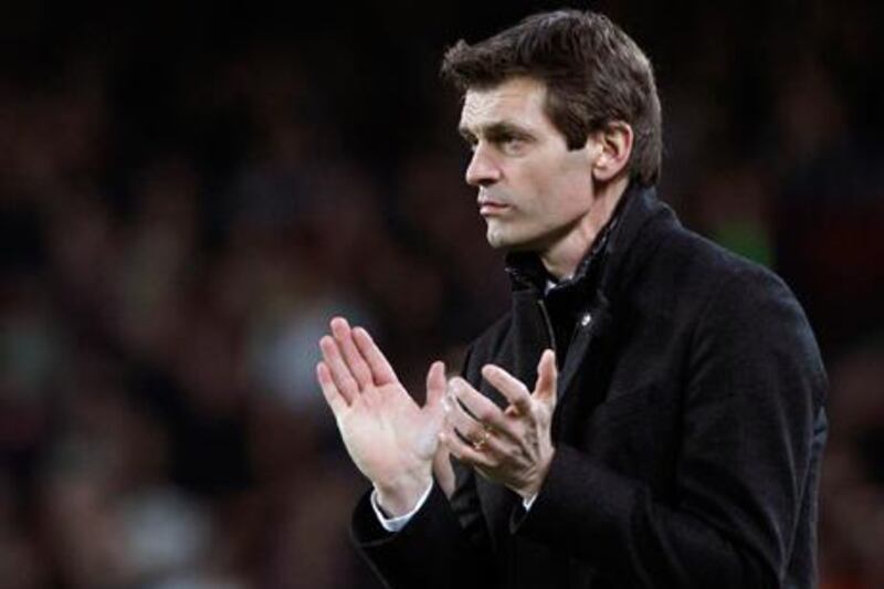 Barcelona coach Tito Vilanova encourages his side during his return to action following cancer surgery.