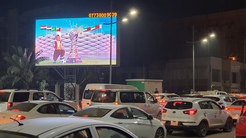 An electronic board features an advertisement promoting the tournament