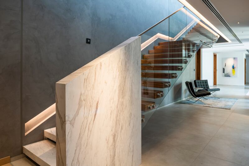 A sleek and modern glass staircase.