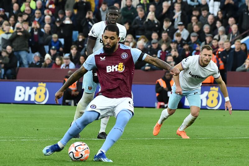 Aston Villa's Douglas Luiz scores his side's second goal from the penalty spot. AP