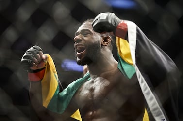 JACKSONVILLE, FLORIDA - APRIL 09: Aljamain Sterling celebrates after his UFC bantamweight championship fight against Petr Yan of Russia during the UFC 273 event at VyStar Veterans Memorial Arena on April 09, 2022 in Jacksonville, Florida.    James Gilbert / Getty Images / AFP
