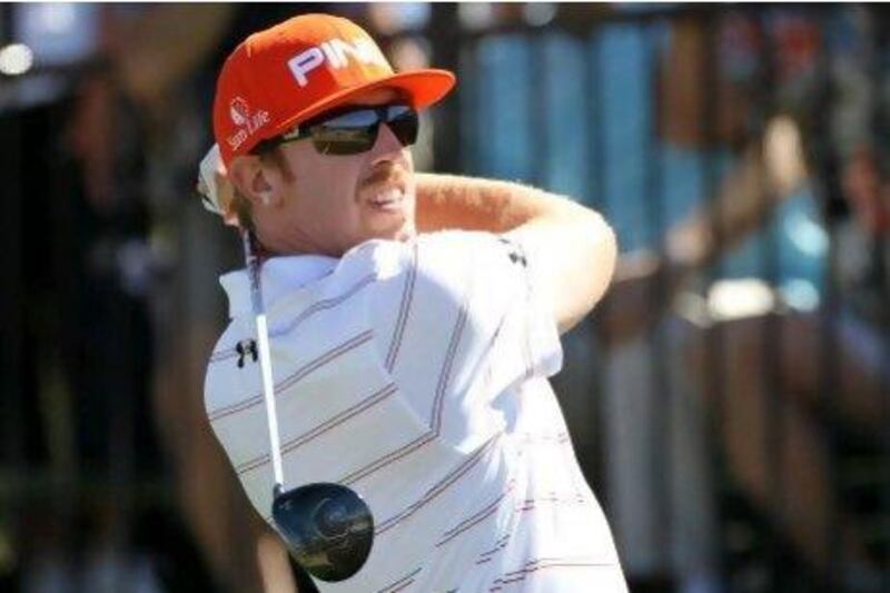 Hunter Mahan hits his tee shot on the first hole during the championship match of the final round of the World Golf Championships-Accenture Match Play Championship at the Ritz-Carlton Golf Club in Marana, Arizona.