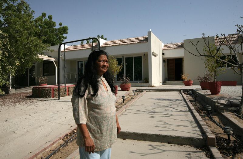 DUBAI-AUGUST 27,2008 - Lajo Gupta stand infront of his house in  Jebel Ali Village as villager left their houses. ( Paulo Vecina/The National ) *** Local Caption ***  PV Jebel Ali 26.JPGPV Jebel Ali 26.JPG