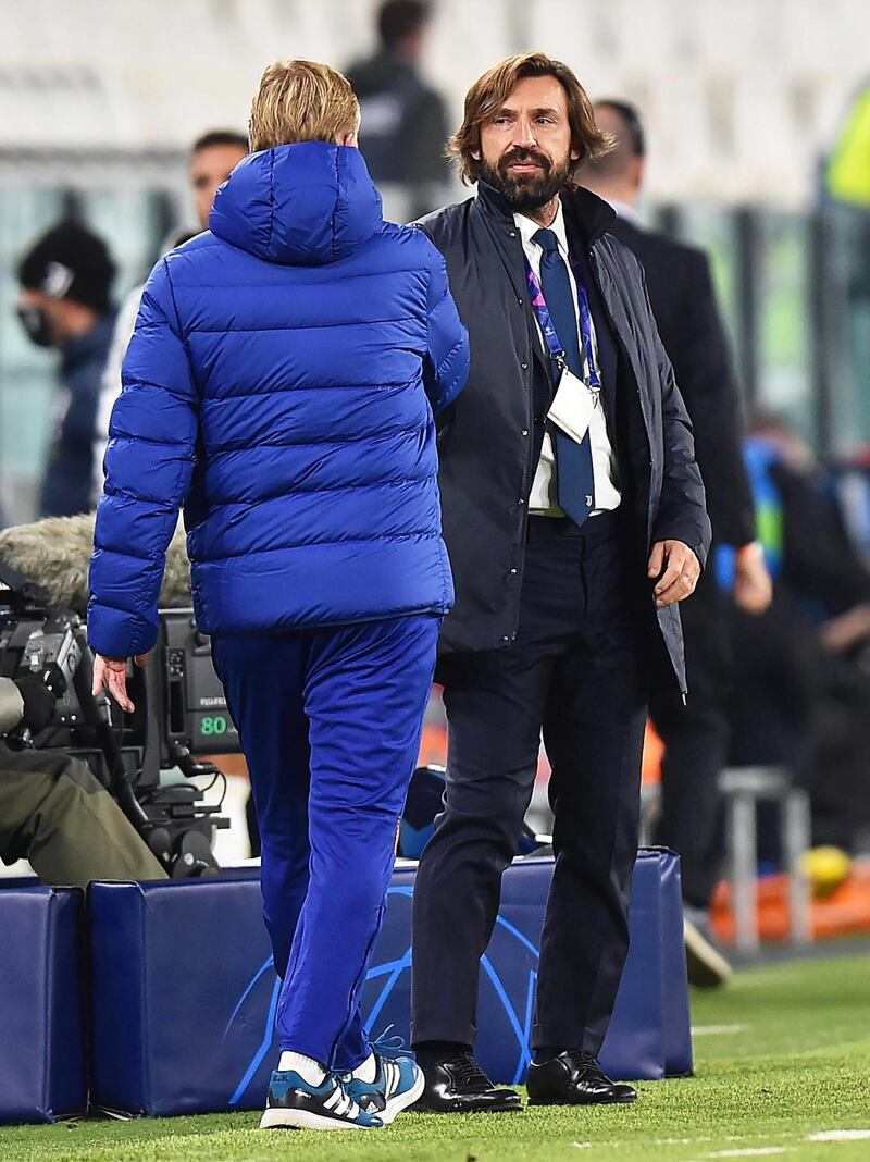 Juventus' head coach Andrea Pirlo greets Barcelona's coach Ronald Koeman. EPA