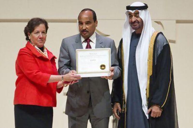 Sheikh Mohammed bin Zayed, the Crown Prince of Abu Dhabi and Deputy Supreme Commander of the Armed Forces, alongside HE Mohamed Ould Abdel Aziz, the President of Mauritania, present Ceres, represented by its CEO Mindy Lubber, with the Non-Governmental Zayed Future Energy Prize.