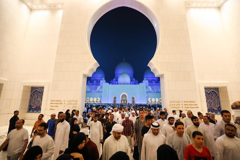 Tens of thousands of worshippers pray at Sheikh Zayed Grand Mosque in Abu Dhabi on Saturday night. Courtesy Sheikh Zayed Grand Mosque