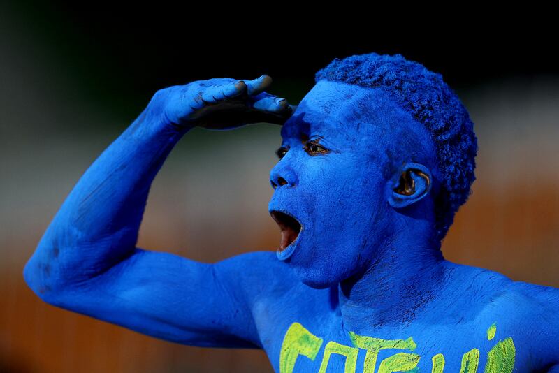 A football fan from the Democratic Republic of the Congo watches as his national team knocks out Egypt on penalties in the round of 16 of the Africa Cup of Nations on Monday. Reuters