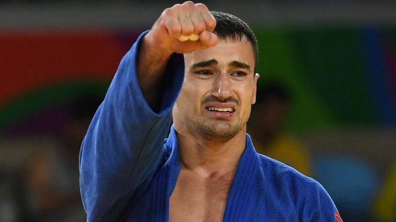 <p>Sergiu Toma celebrates after defeating Italy&#39;s Matteo Marconcini during their men&#39;s 81kg judo bronze medal match at&nbsp;the Rio 2016 Olympic Games in Rio de Janeiro on August 9, 2016. AFP</p>
