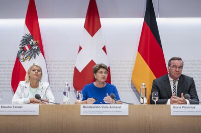 Defence ministers from Austria, Switzerland and Germany signed a letter of intent in Bern on Friday. EPA 