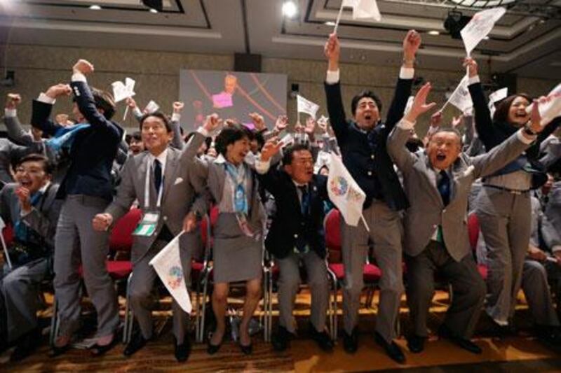 Shinzo Abe, the Japanese prime minister, third right, made an inspiring speech to give Tokyo a win.