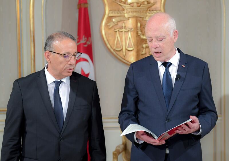 Tunisian President Kais Saied, right, on Thursday appointed Ridha Gharsallaoui, left, a former national security adviser to the presidency, to run the Ministry of the Interior.