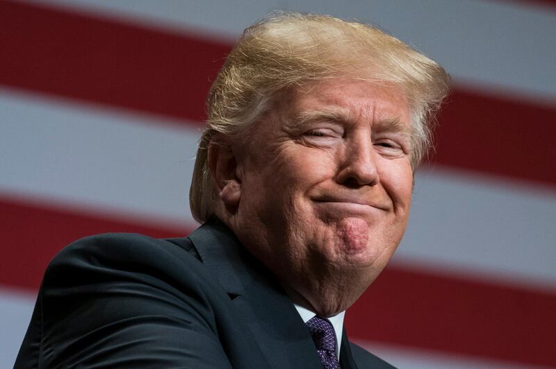 epaselect epa06397736 US President Donald J. Trump speaks on his 'America First' national security strategy in the Ronald Reagan Building and International Trade Center in Washington, DC, USA 18 December 2017. Trump's strategy puts American sovereignty over international relations, particularly on issues of border security.  EPA/JIM LO SCALZO