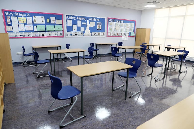 DUBAI, UNITED ARAB EMIRATES , August 9 – 2020 :- View of the class room with 1.5 meter distance on the table for Covid 19 safety measure at the Dubai British School in Jumeirah Park in Dubai. New Covid safety setup in different areas of the school such as hand sanitizer , safety message, social distancing stickers pasted on the floor, thermal cameras will be installed at the entrance of the school. School will open on 30th August. (Pawan Singh / The National) For News/Online/Instagram. Story by Kelly