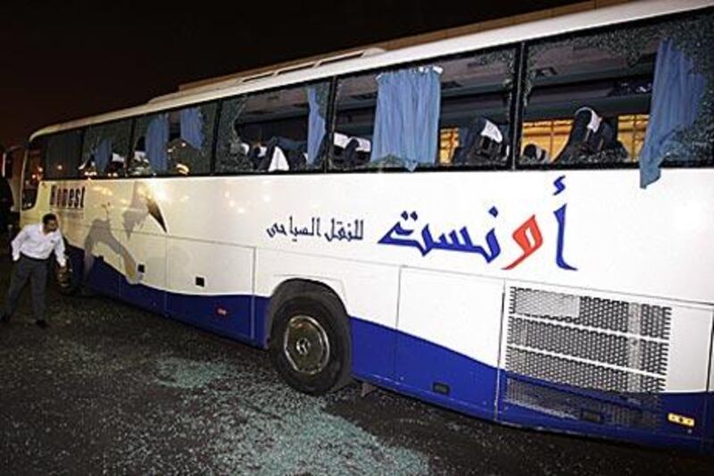 One of the damaged buses carrying the Algerian football team is seen in Cairo, Egypt, on 12 November 2009. The bus was attacked by Egyptians injuring three players.