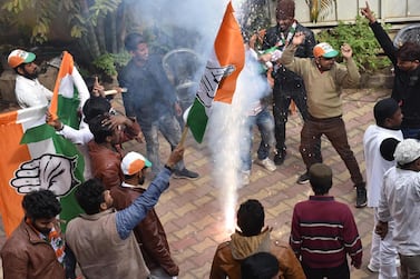 Congress-JMM alliance workers celebrate results projecting an assembly majority in the Jharkhand state election in Ranchi on December 23. AFP