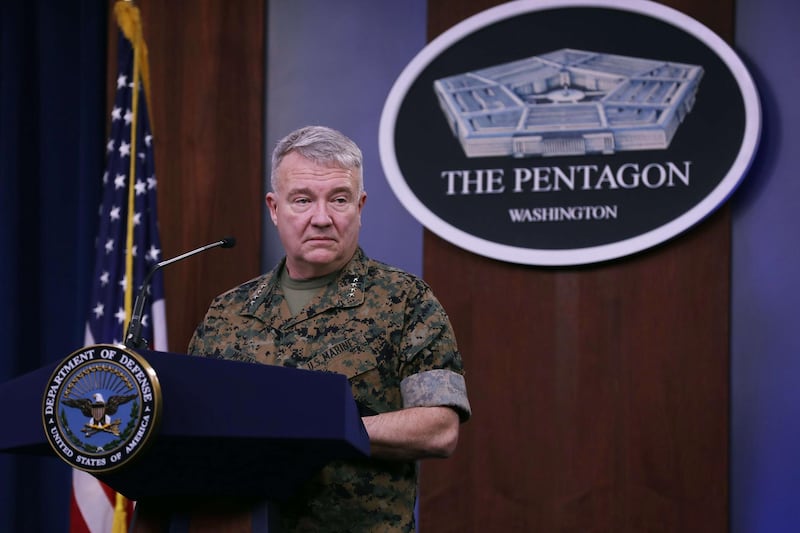Marine Corps Gen Kenneth F McKenzie, commander of US Central Command, talks to journalists about the military response to rocket attacks that killed two US and one UK service members in Iraq. Getty Images via AFP