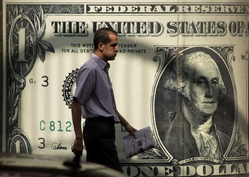 Egypt has moved its currency to a floating rate in a bid to meet the criteria for an IMF loan. Amr Nabil / AP Photo